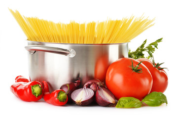 Stainless pot with spaghetti and variety of raw vegetables