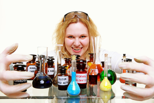 Crazy chemist woman with chemical glassware flask isolated