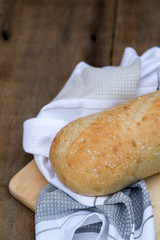 Loaf of sourdough bread in rustic kitchend setting