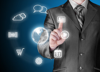 Business man pressing an icon in air