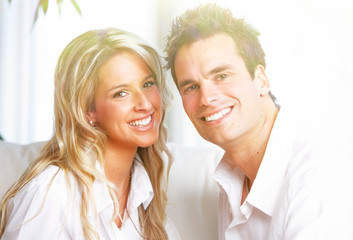 Happy couple at home.