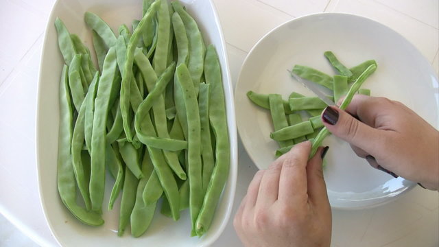 Hands Cutting Green Beans