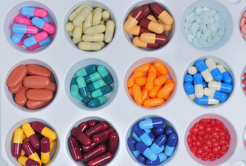 assortment of pills and capsules