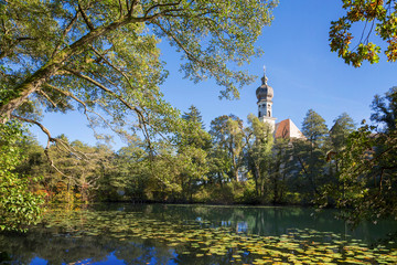 Old bavarian monastery with pond