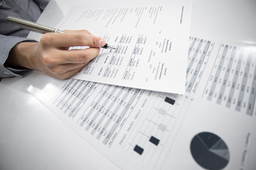 woman hand with business report