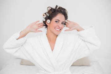 Fototapeta premium Cheery smiling brunette looking at camera