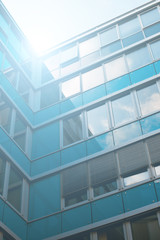 Fototapeta na wymiar detail of office building - glass facade