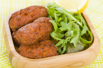 Koftas - Asian style meatballs served with salad and pita bread.