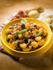 homemade gnocchi with ragout sauce, selective focus