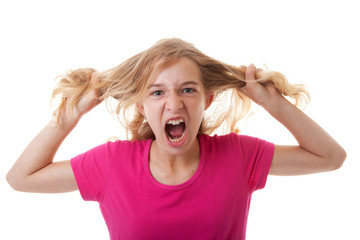 Angry girl is pulling her hair