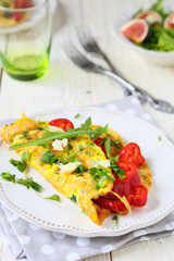 scrambled eggs with bell peppers and arugula