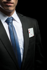 detail photo, ace card in his suit pocket