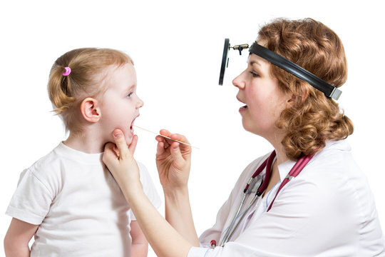 doctor examining child isolated