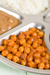Chana Masala - Spicy chickpea curry served with in a thali.