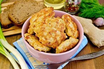 Fritters chicken with bread on the board