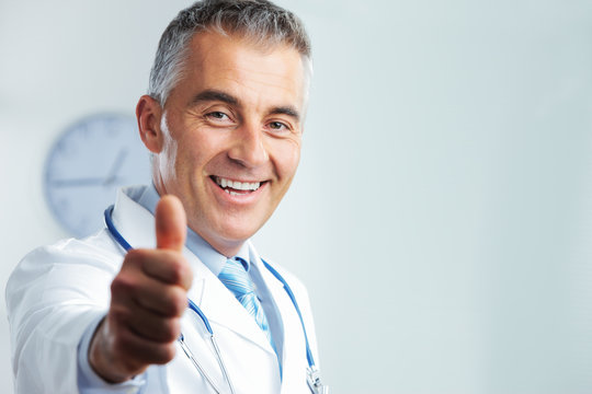 Middle-aged Doctor Showing Thumbs Up