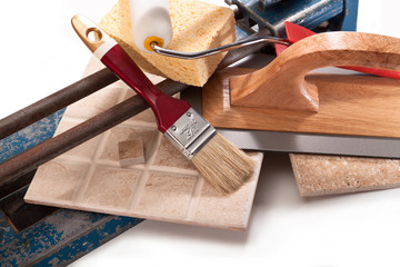 Painting of walls and gluing tiles