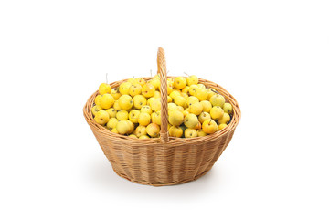 yellow apples in a wicker basket