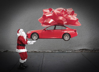 Santa claus with car gift.