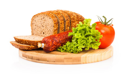 bread and smoked sausages isolated on white