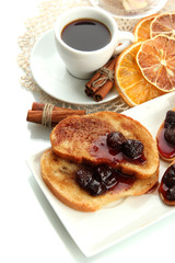 White bread toast with jam and cup of coffee, isolated on white