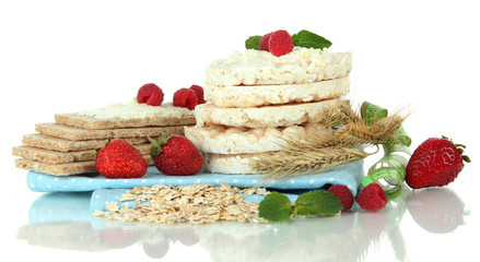 Tasty crispbread with berries, isolated on white
