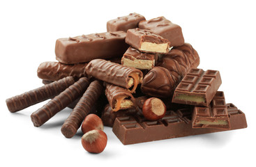 Delicious chocolate bars with nuts isolated on white