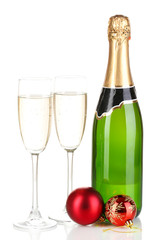 Bottle of champagne with glasses and Christmas balls isolated
