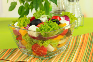Greek salad on plate on table close-up
