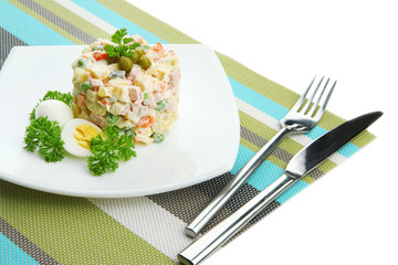 Russian traditional salad Olivier, isolated on white