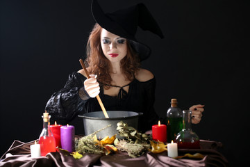 Halloween witch on black background