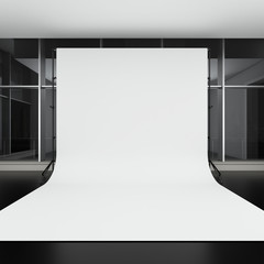 White backdrop in dark room
