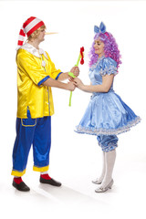 Couple of happy clowns in Pinocchio and Malvina suits