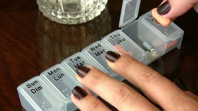 Holding a Pill Capsule