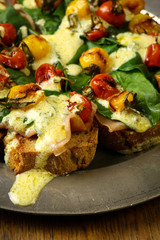 Crostini with prosciutto, swiss chard, cherry tomato vinaigrette