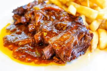 Grilled meat ribs on the plate