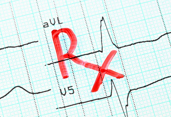 RX (prescription) inscription on cardiogram.