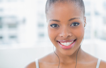 Close up of woman listening to music