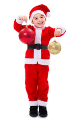 Little Santa Claus boy showing Christmas ornaments