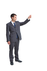 Smiling businessman holding something up in the air