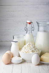 Dairy products on wooden table close-up