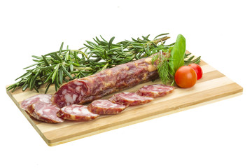 Salami with rosemary, basil and tomato
