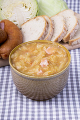 Bigos, sauerkraut and sausage stew with ingredients.