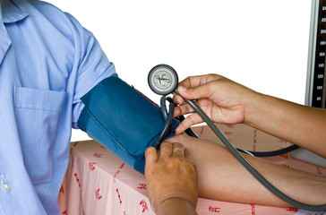 Hands of a doctor measuring blood pressure of the patient s arm