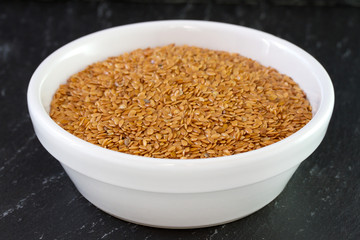 linseeds in white bowl