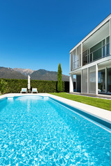 Modern villa with pool, view from the garden