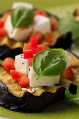 Grilled eggplant with feta cheese and red peppers