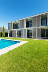 Modern house with pool, view from the garden