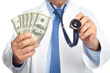 Hands of medical doctor with money.