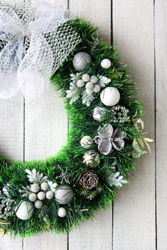 Christmas Wreath In Silver On White Door